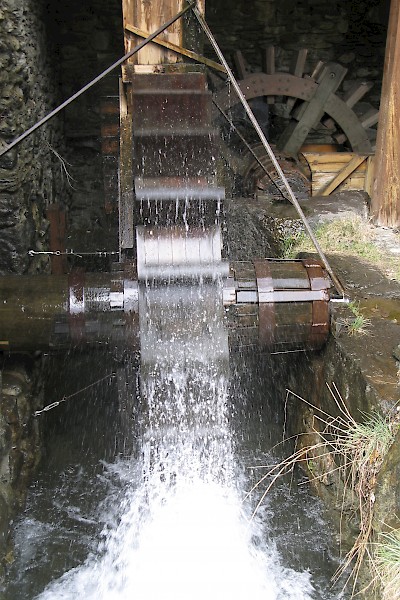 A water wheel used for producing power to operate the foundry hammer that made iron for shipbuilding, weapons and agricultural tools.